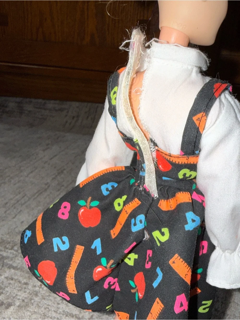 vintage 1995 Mattel Teacher Barbie doll outfit, featuring a black jumper dress